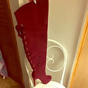 Thigh high lace up heels